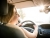 Jeune femme au volant d'une voiture Jeune femme au volant d'une voiture